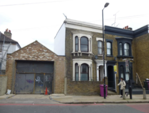 street view of a brick house